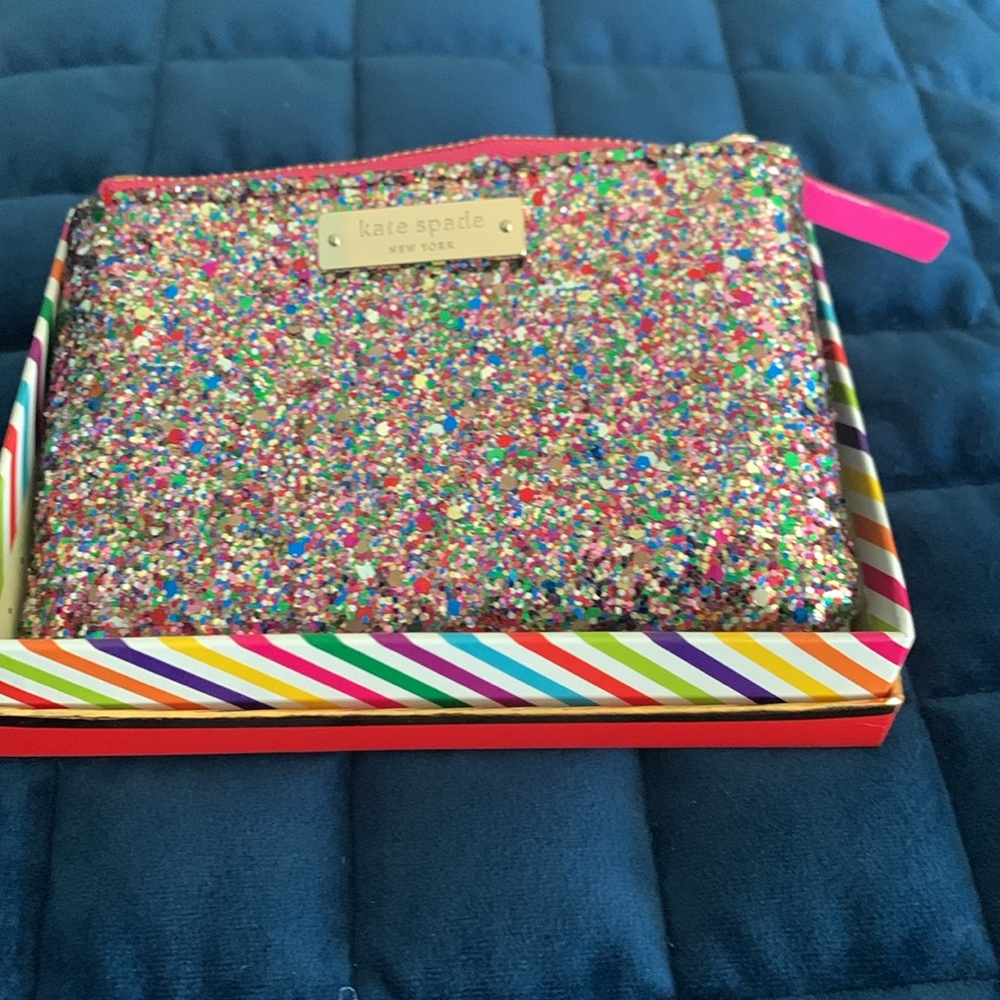 Kate Spade  Little GIA GLITTERBALL Pouch.   Never carried. Multi color glitter.
